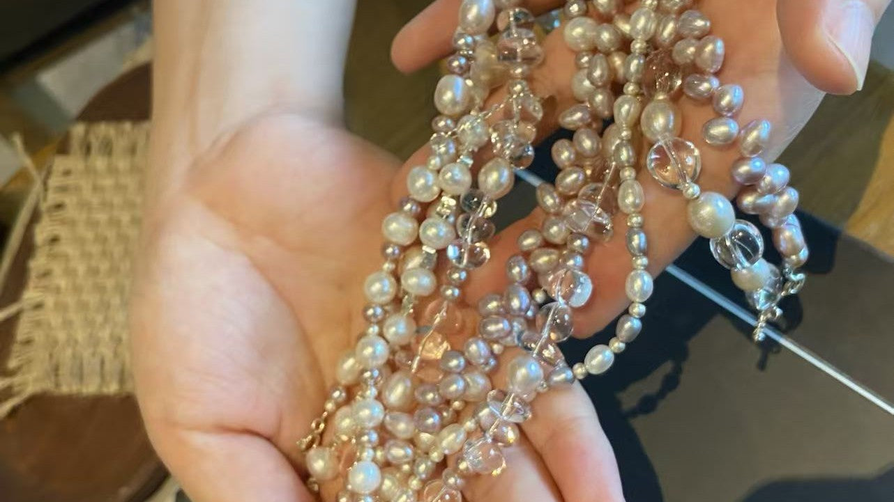 Freshwater pearl jewelry showing natural variations in pearl shape and luster