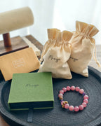 packaging
Handmade pink natural stone bracelet with Manye Rituals jewelry packaging