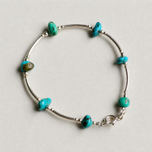 Handmade turquoise bracelet with sterling silver accents
