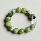 Handmade Xiuyu jade bracelet with clear quartz accent