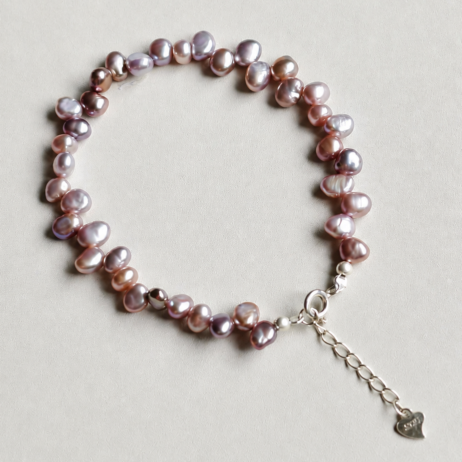 Handmade purple baroque pearl bracelet with silver accents