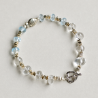 Handmade blue topaz and clear quartz bracelet with silver fish detail