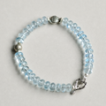 Handmade blue topaz bracelet with sterling silver fish and heart clasp