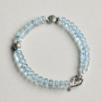 Handmade blue topaz bracelet with sterling silver fish and heart clasp