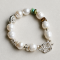 Handmade baroque pearl and turquoise bracelet with silver shell detail