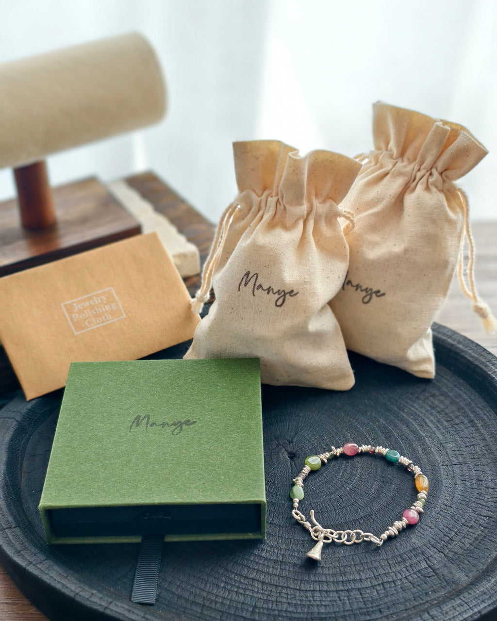 Handmade colorful gemstone bracelet with Manye Rituals jewelry packaging