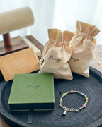 Handmade colorful gemstone bracelet with Manye Rituals jewelry packaging