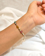 Nature inspired gemstone bracelet with colorful stones worn as handmade jewelry